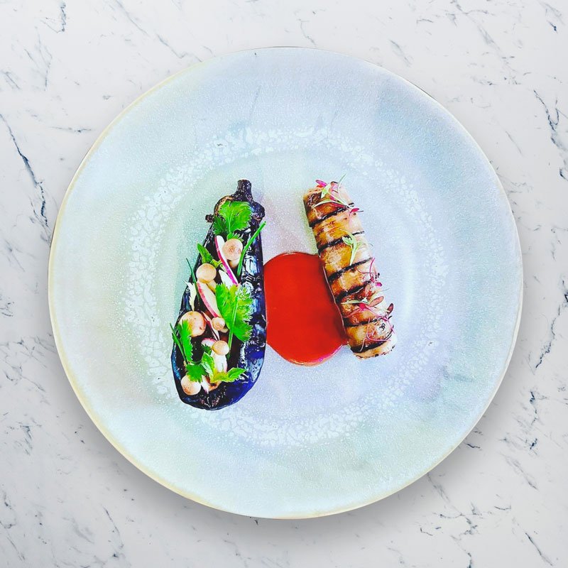 Image showcasing a tantalizing array of Mediterranean seafood dishes by Signature Chef Cy, featuring a colorful assortment of fresh seafood, vibrant spices, and enticing presentation, evoking the essence of Mediterranean culinary artistry.