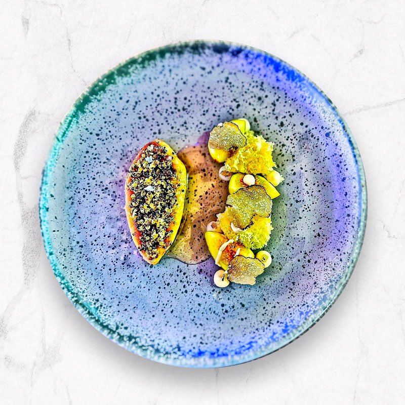 Image showcasing a beautifully crafted culinary dish by Signature Chef Cy, featuring vibrant colors, exquisite plating, and artistic presentation.