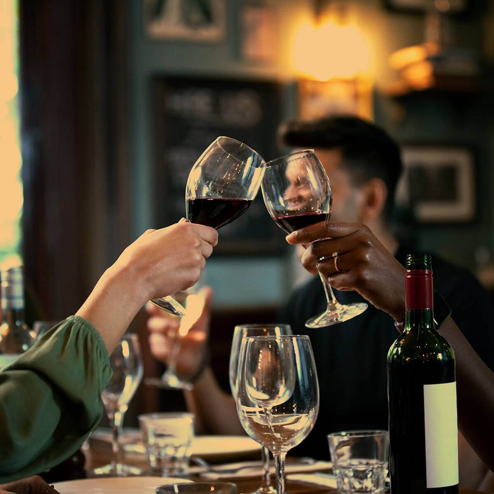 Image portraying the magic of wine and cuisine coming together in perfect harmony, courtesy of the sommeliers at Signature Chef Cy, inviting diners to a flavorful journey where each sip and bite tells a story of passion and perfection in the dining experience.